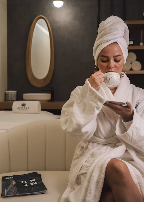 Guest relaxing at spa in a bathrobe